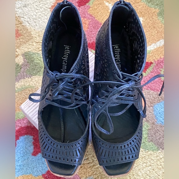 Jeffrey Campbell Shoes - Jeffrey Campbell perforated black leather wedges size 6.